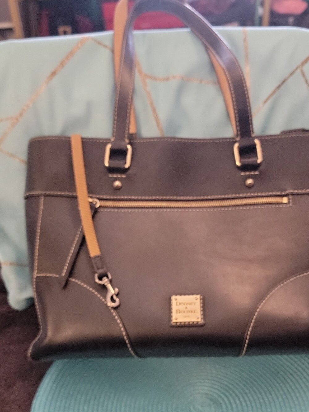 Dooney & Bourke Black Leather Tote with Tan Strap Accent